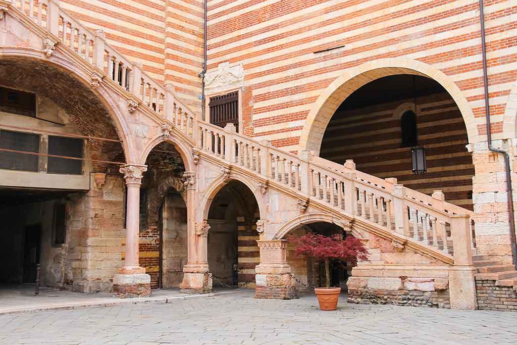 Staircase of reason in courtyard the Palazzo della Ragione in Verona, Italy